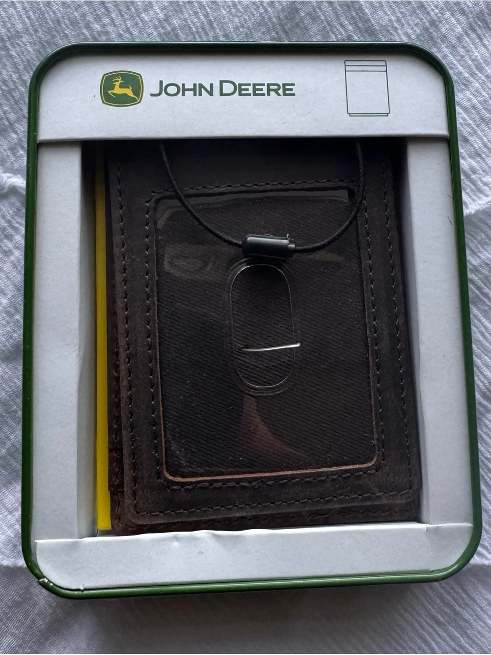 John Deere genuine leather money clip wallet in its original collectible tin.